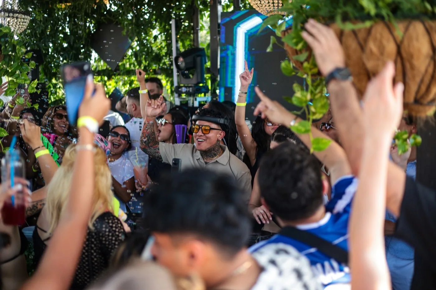 Elsewhere Too live activation — crowd and DJ mid-set under the pavilion